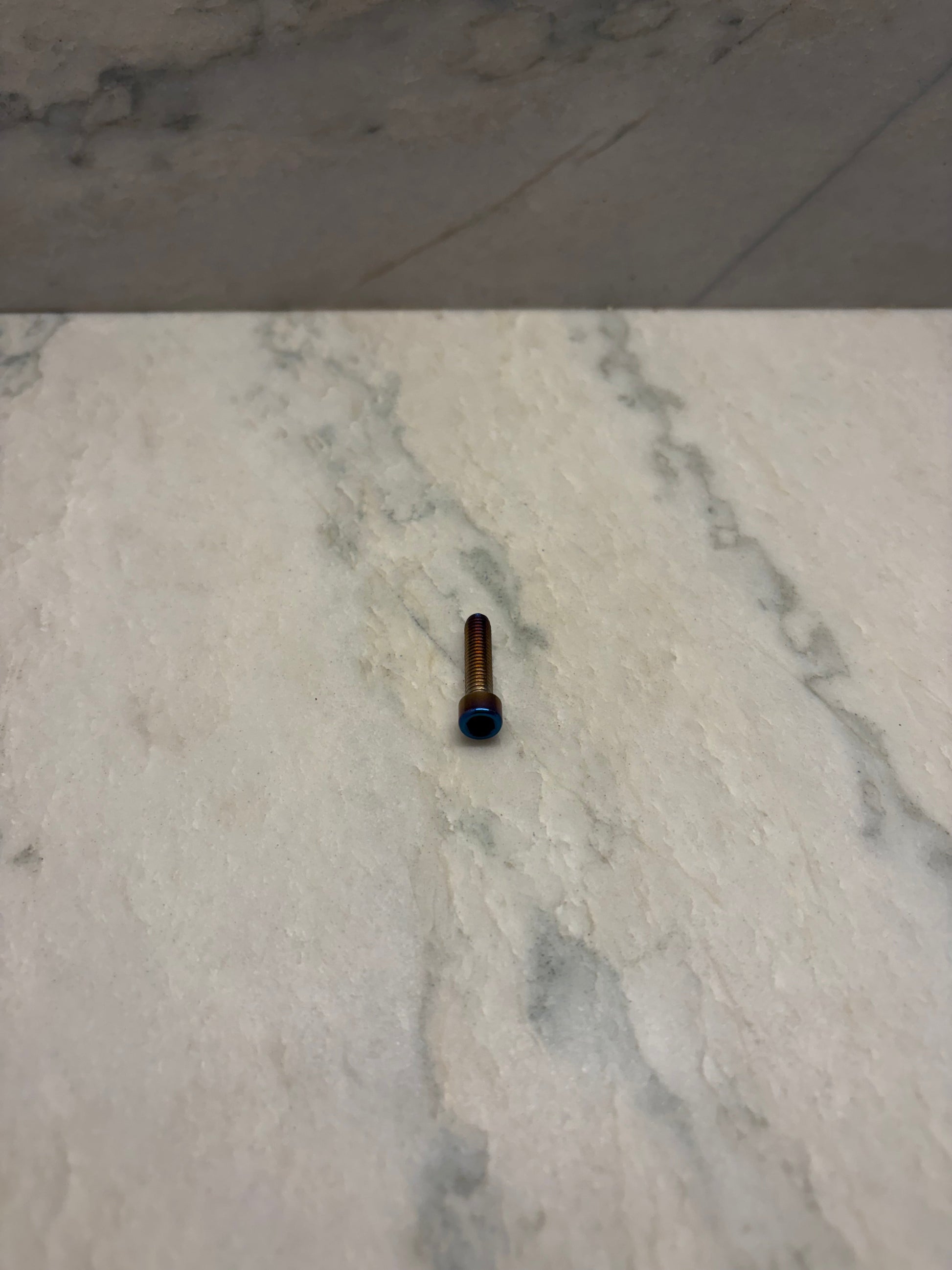 Trp break mounting bolt