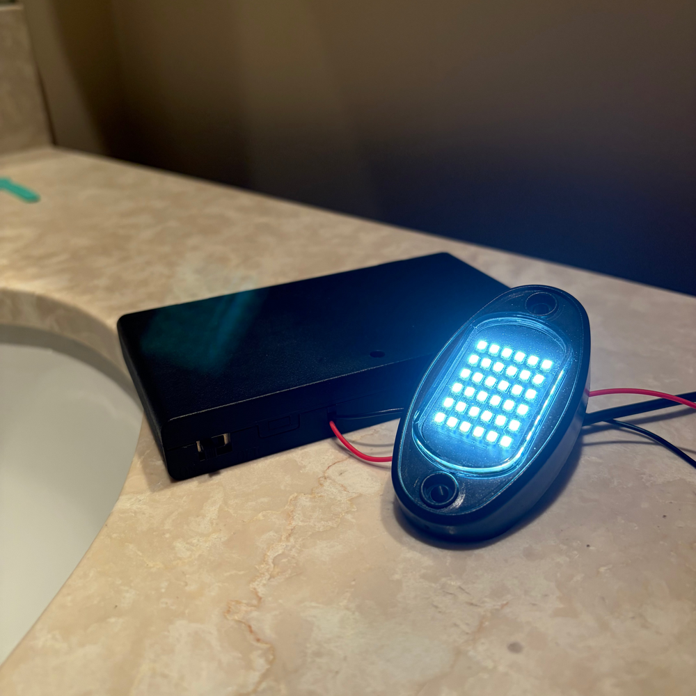 Battery powered rock light